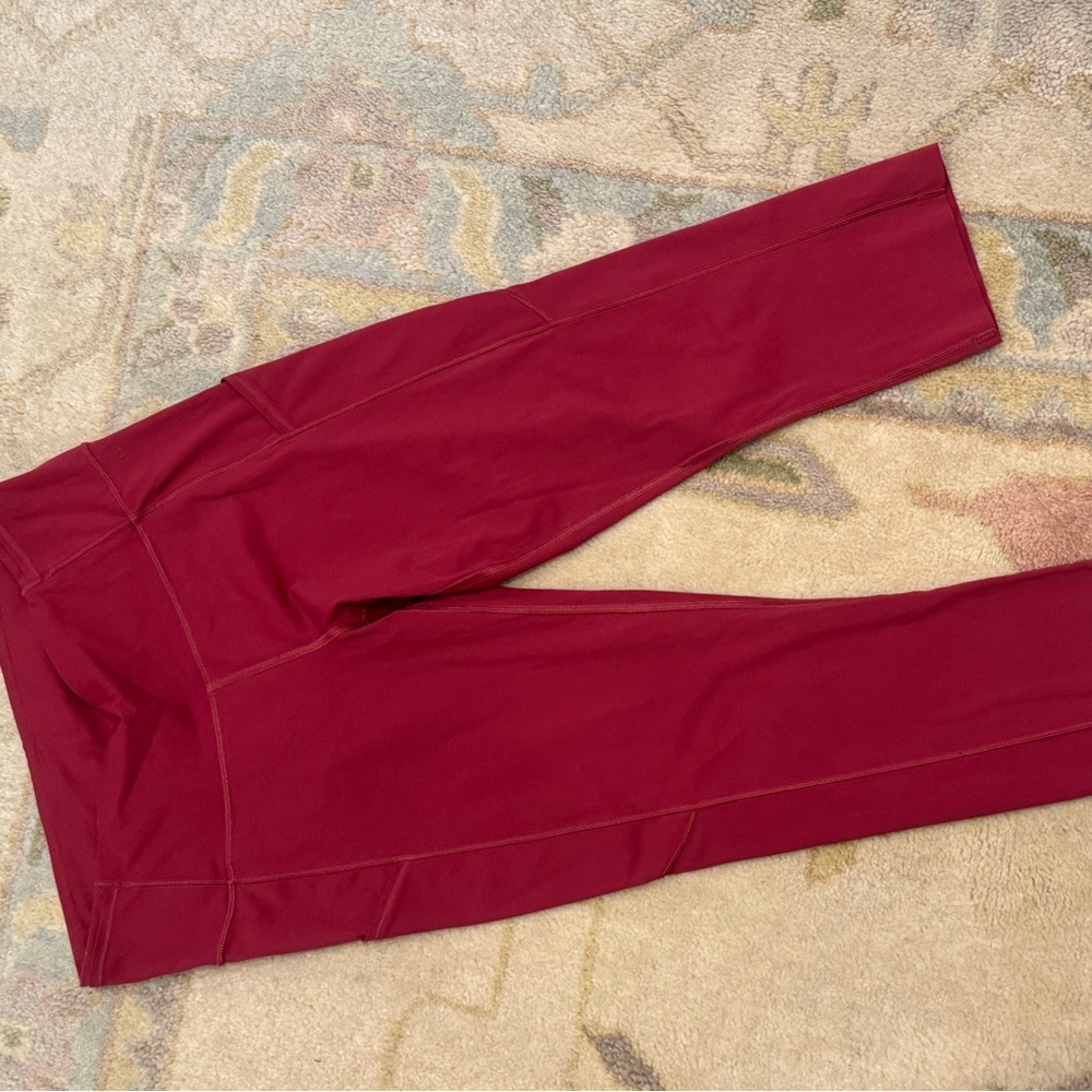 Used lululemon sz 10 Maroon/red Athletic Leggings pockets love!